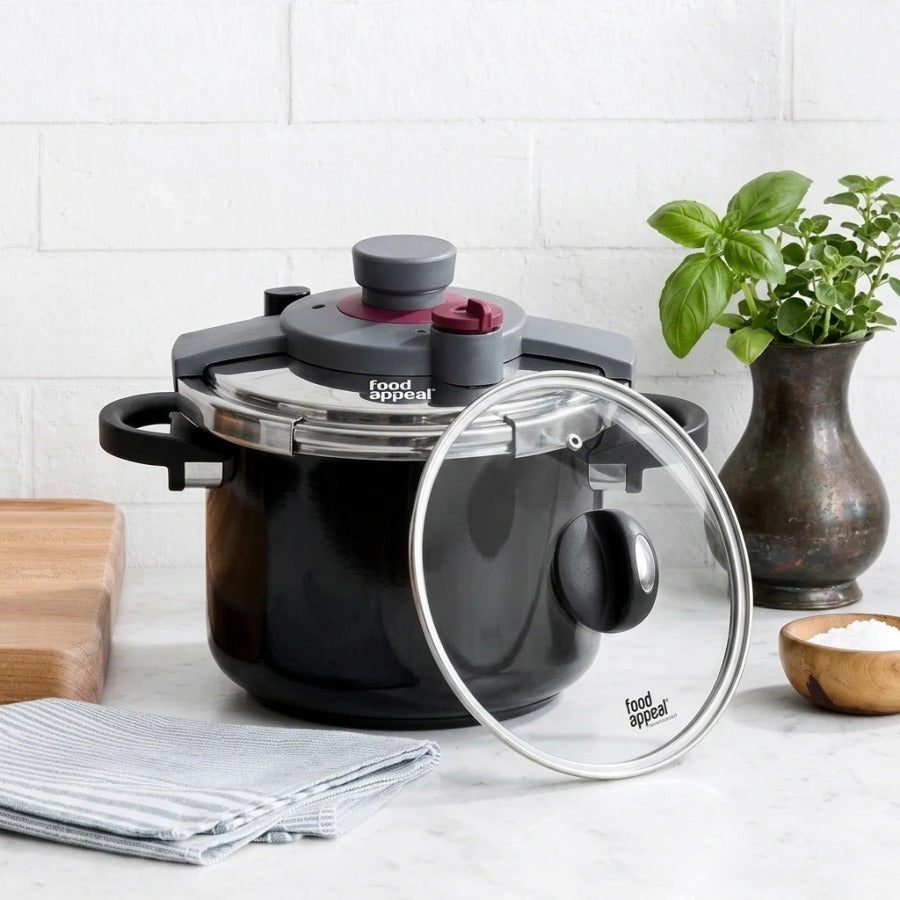 סיר לחץ בטיחותי 8 ליטר \ 24 ס"מ POWERLOCK | Surround the cookware with light, airy styling props in the same clean, minimal, natural-light mood as "Visual Reference 1" — choose 1-2 simple elements such as