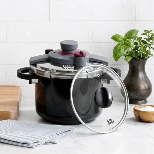 סיר לחץ בטיחותי 8 ליטר \ 24 ס"מ POWERLOCK | Surround the cookware with light, airy styling props in the same clean, minimal, natural-light mood as "Visual Reference 1" — choose 1-2 simple elements such as